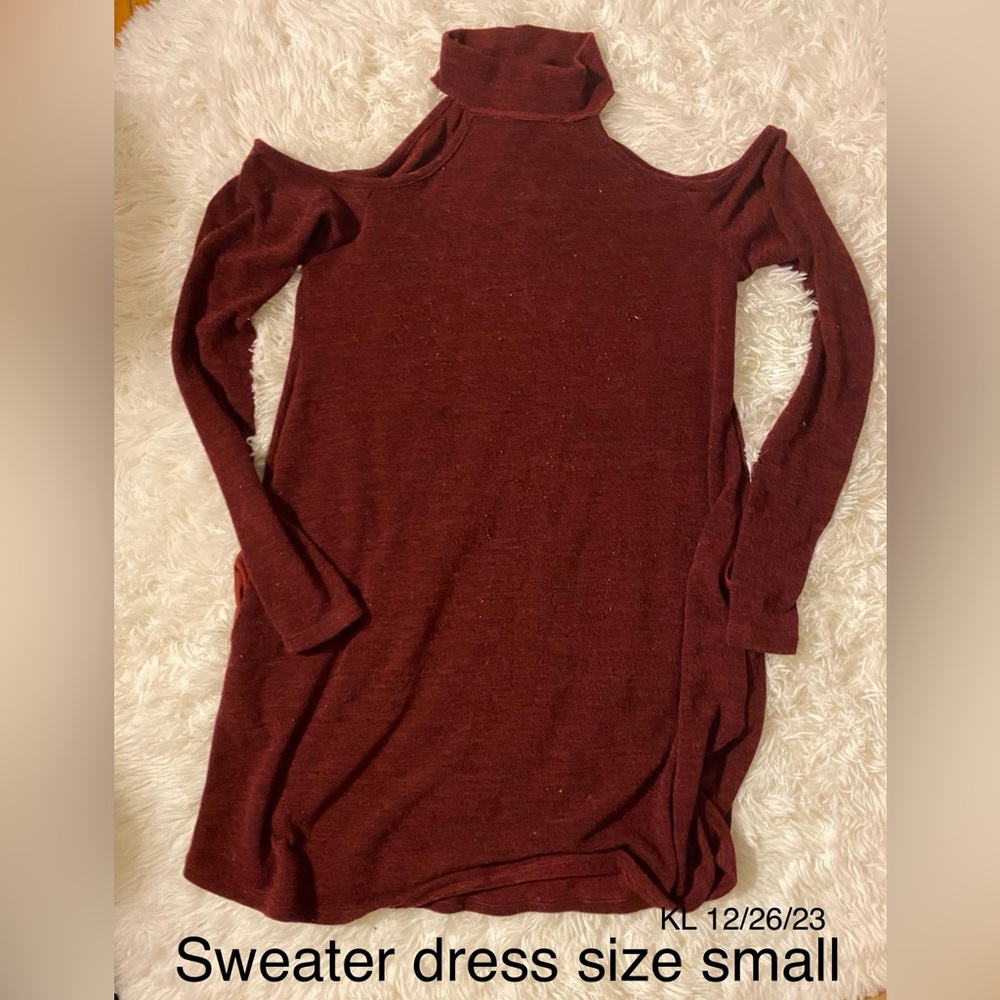 Boutique sweater dress with shoulder cut outs. Size small